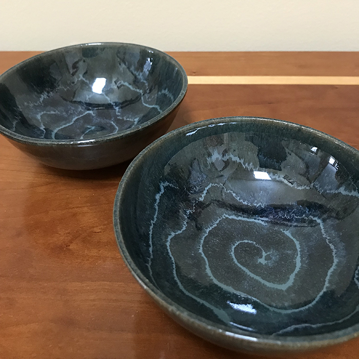 Item 457 and 459. These brown stoneware bowls have an attractive spiral design inside. See sizes below.<br>