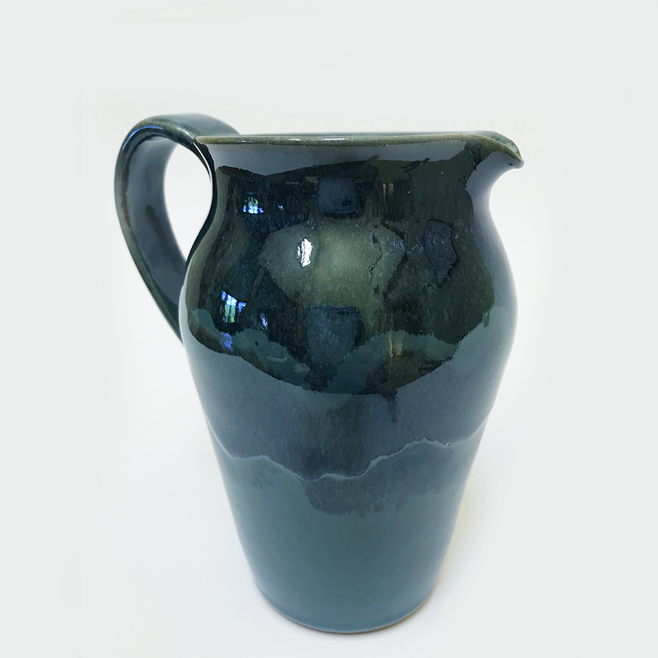 Item 470<br>Tall blue-glazed pitcher to use for any liquids or as a flower vase, 6.0 in x 3.75 in wide.<br>