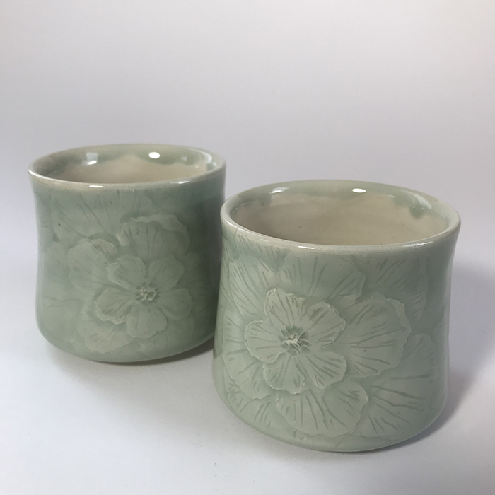 Item 586<br>Light aqua celadon glazed teacups, 2.5 in tall x 3 in wide<br><b>$40 each</b>