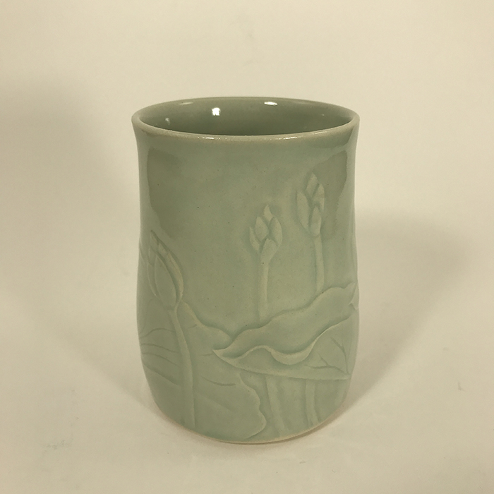 Item 683<br>Hand carved lotus flowers tumbler, 4 inches tall x 3 inches in diameter<br><b>$60</b>