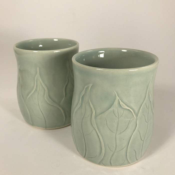 Item 707<br>Two carved leaves tumblers, 3.5 inches tall x 3.0 inches in diameter<br><b>$40 each</b>