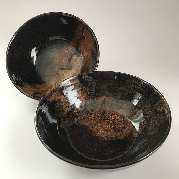 Item 579a (Sold) and 579b<br>Black and copper glazed white stoneware bowls, 3 in tall x 8.25 in wide<br><b>$50</b>