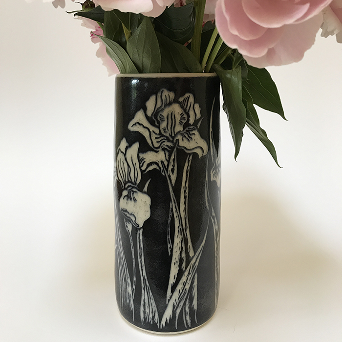 Item 42<br>Black sgraffito vase with carved iris flowers<br>7.5 in tall x 3.0 in wide<br>Sold