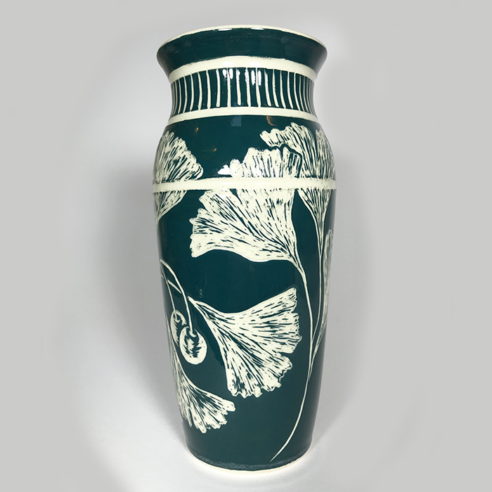 Item 510<br>Dark green sgraffito vase on white stoneware with ginkgo leaves<br>7.5 in tall x 3.25 in wide<br><b>Sold</b>