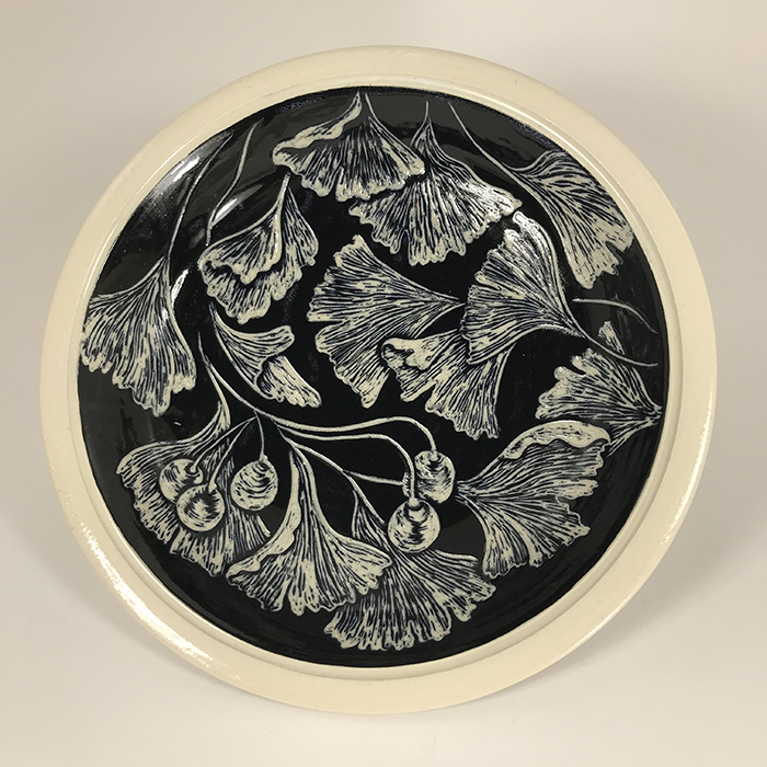 Item 613<br>Black sgraffito bowl on white stoneware with carved gingko leaves<br>1.75 in tall x 8.75 in wide<br><b>Sold</b>