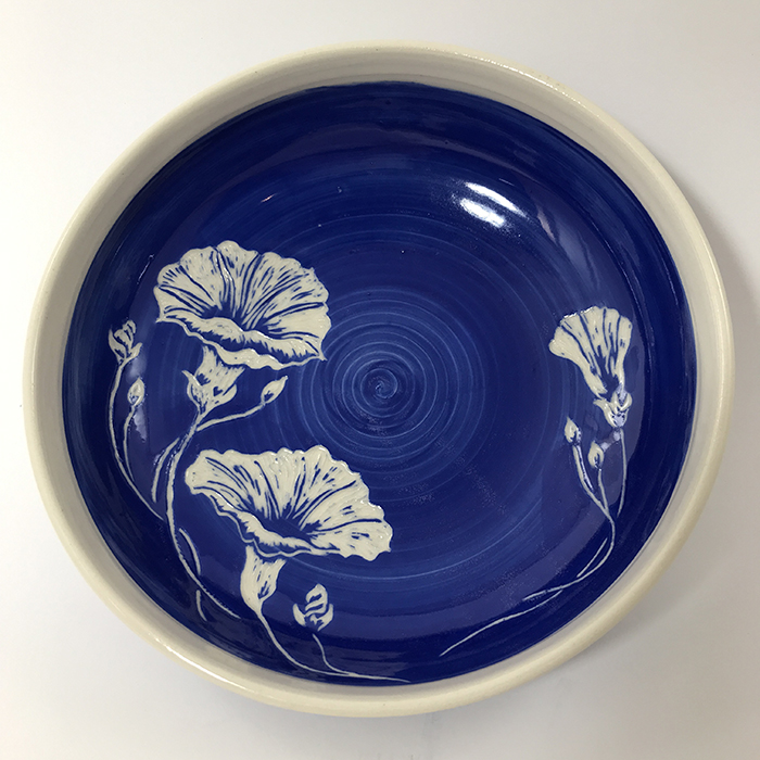 Item 628<br>Royal blue sgraffito bowl on white stoneware with carved morning glory flowers<br>2.25 in tall x 7.5 in wide<br><b>Sold</b>