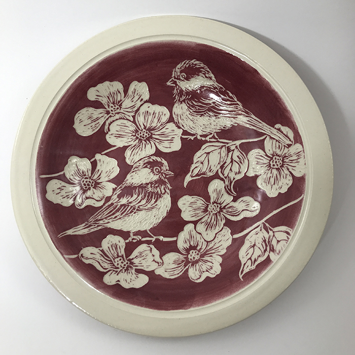 Item 631<br>Rose sgraffito bowl with carved dogwood flowers and chickadees<br>1.5 in tall x 9.0 in wide<br><b>Sold</b>