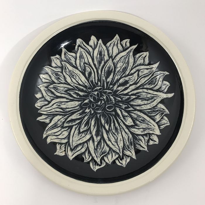Item 646<br>Black sgraffito bowl on white stoneware with carved dahlia flower<br>1.25 in tall x 8.5 in wide<br>