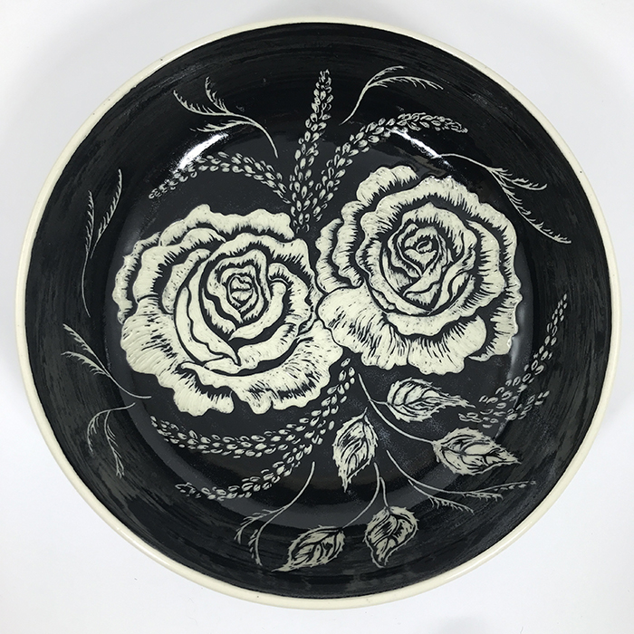 Item 652a<br>Black sgraffito bowl with roses (inside)<br><b>$140</b>
