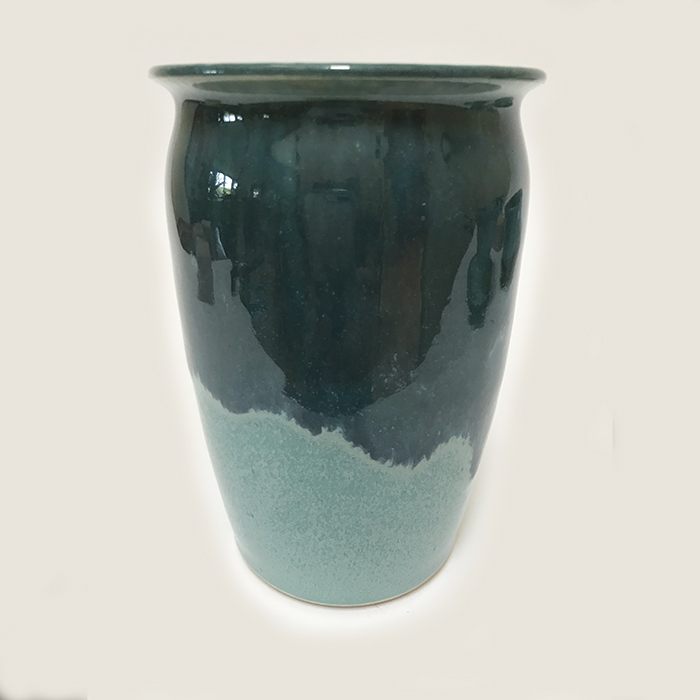 Item 241<br>Turquoise Vase, 5.25 in tall x 3.5 in wide. Great for small flower bouquets.<br><b>$30</b>