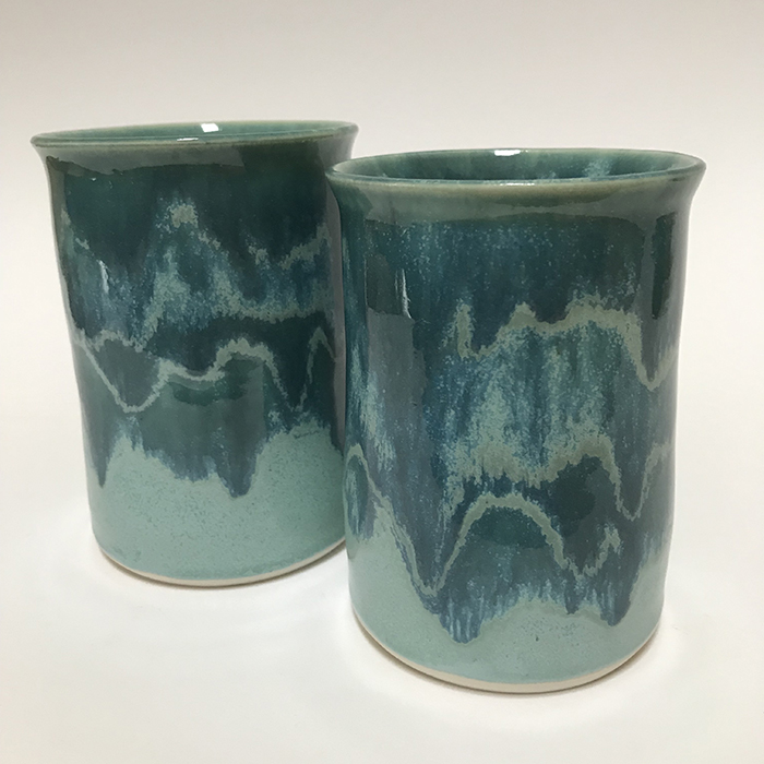 Item 269<br>Turquoise Tumblers, 4.0 in tall x 3.0 in wide. Holds 9 oz. of liquid. May also be used for pens and pencils, make-up brushes, or tooth brushes.<br><b>Sold</b>