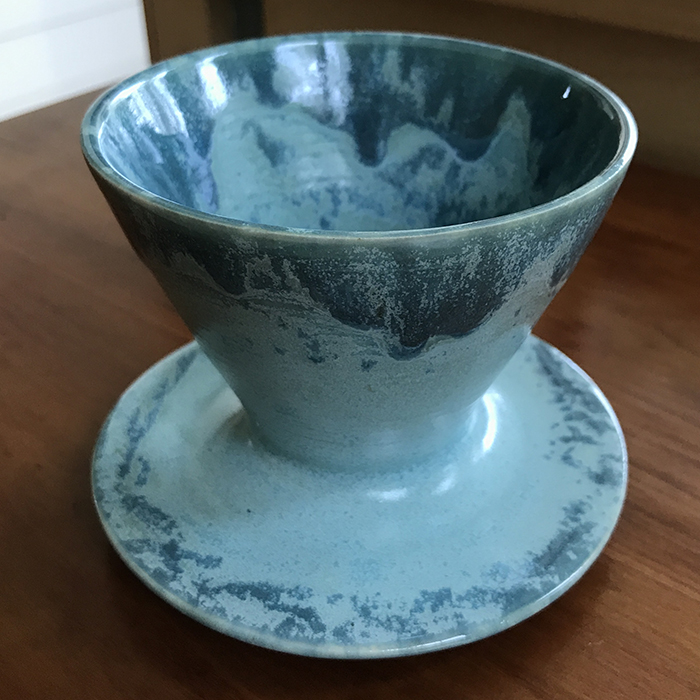 Item 428<br>Turquoise-Glazed White Stoneware Coffee Pour Over, 4.5 in wide x 3.25 in tall. Will accept a #4 filter to make a single mug of coffee directly on your coffee cup. Matching mug (sold separately) also available (Item #528)<br><b>Sold</b>