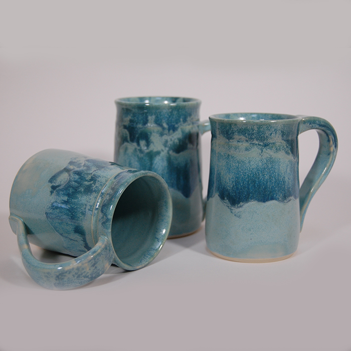Item 528<br>Turquoise-glazed white stoneware mugs. See sizes and capacities below.<br><b>Sold</b>