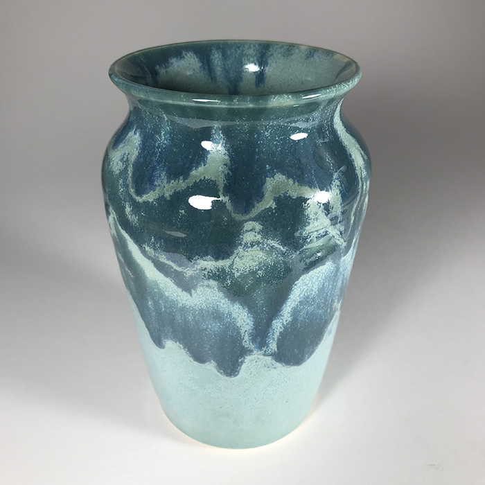 Item 563<br>Turquoise glazed vase on white stoneware, 5.75 in tall x 3.25 in wide<br><b>Sold</b>