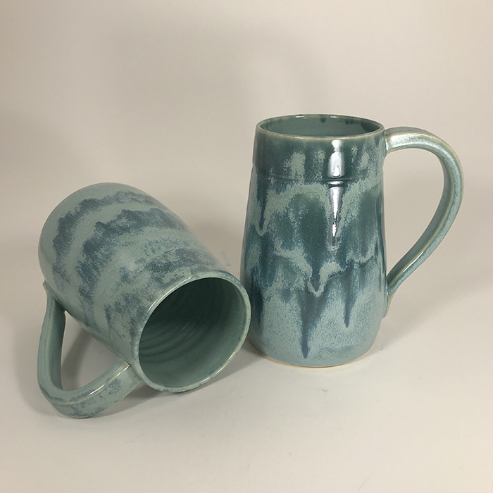 Item 603<br>Large turquoise glazed white stoneware mugs<br>5.5 in tall x 3.5 in wide<br><b>Sold</b>